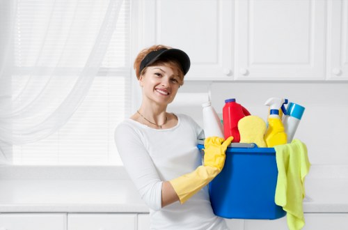 Staff member wearing PPE during carpet cleaning work
